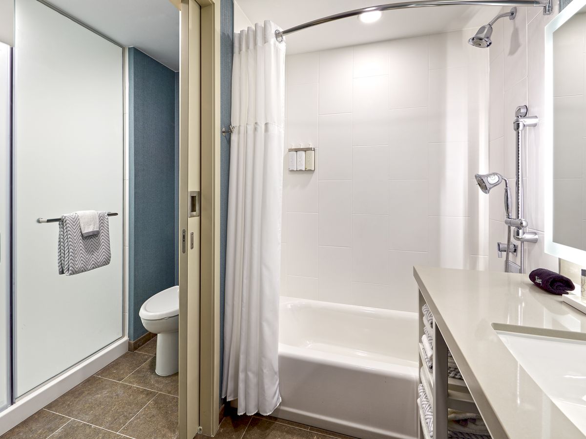Guest Bathroom with 2 Showers